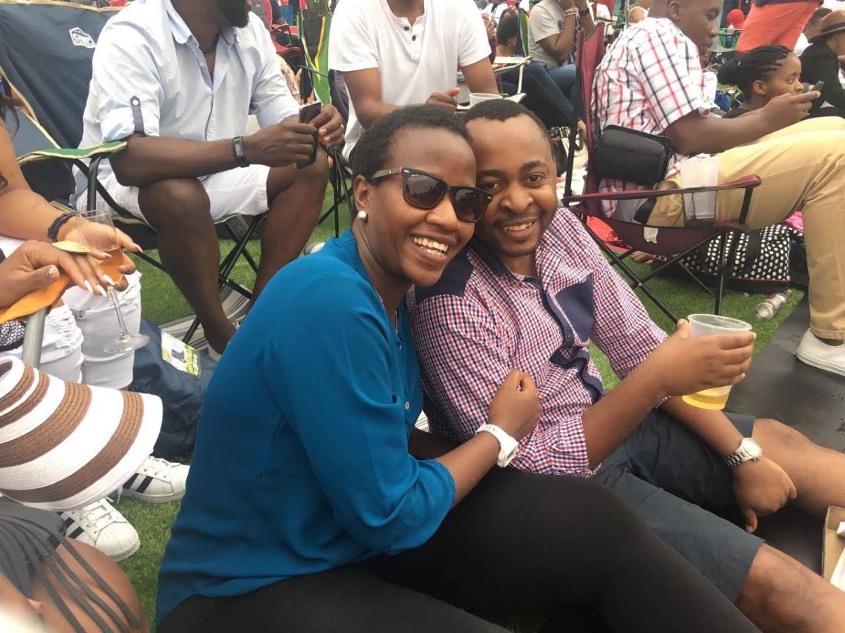 Brian and Manka among friends at an outdoor gathering.